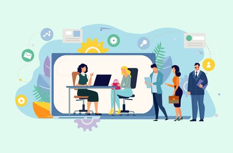 Nous voyons des personnels en train d'effectuer un recrutement à un bureau